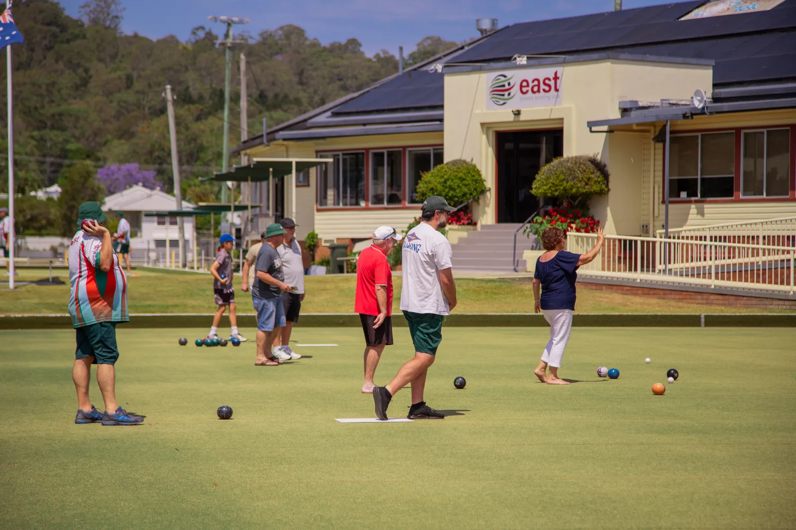 A lively afternoon of social bowls in front of the clubhouse